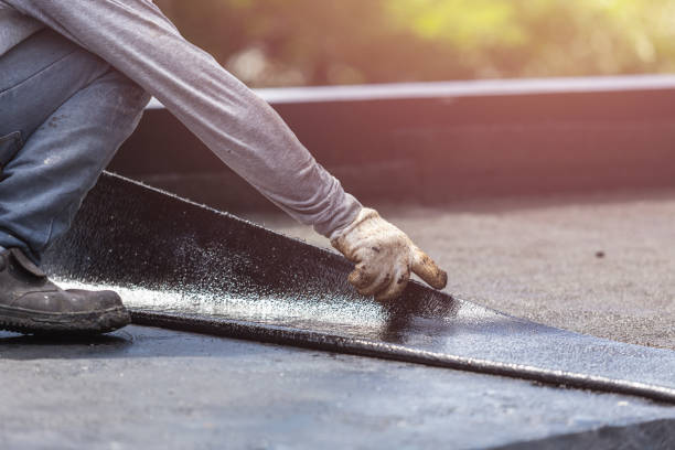 Professional Waterproofing technician working in Rossville, KS